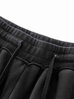 Load image into Gallery viewer, TruthorTruth Raw-Seam Enzyme Washed Sweatpants
